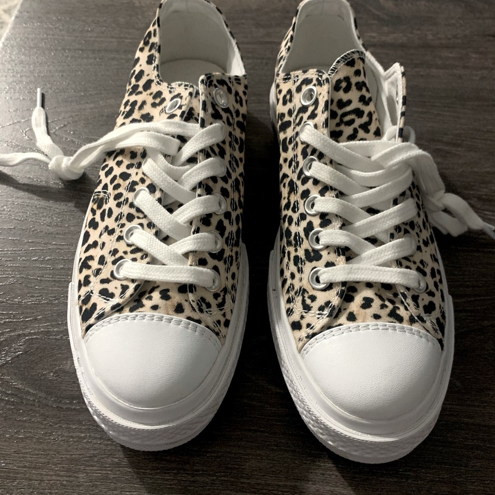 Leopard print sneakers.
